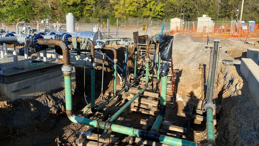 Meter station piping set over concrete foundations