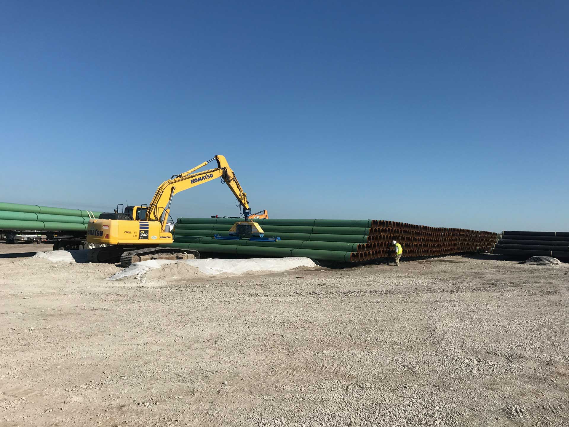 Cross-country pipeline construction across open terrain